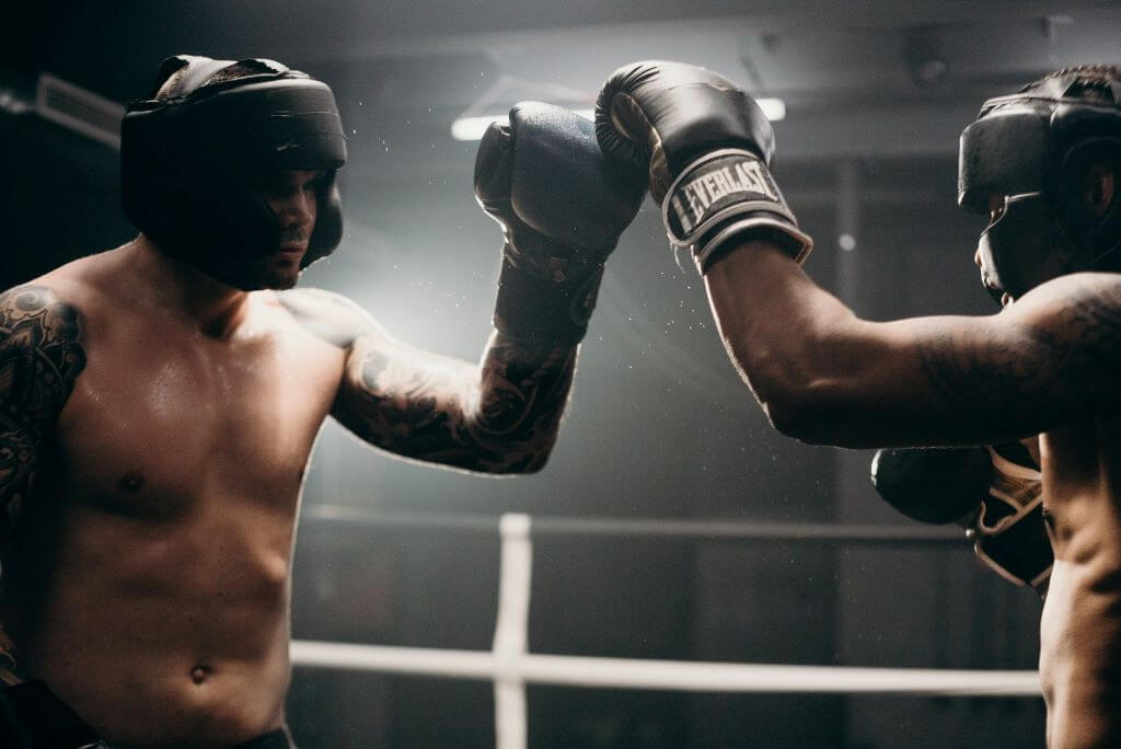 man in black boxing gloves